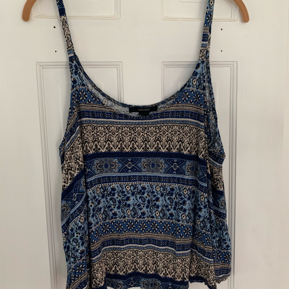 Blue patterned short flowy tank.